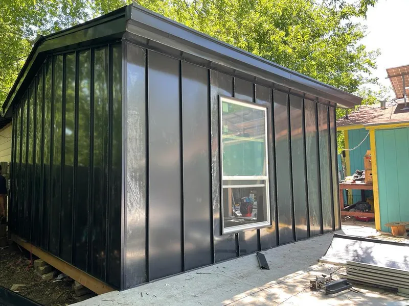 Black standing seam metal wall panels for Roof Inspection in Hanover